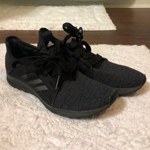 Black Adidas tennis shoes